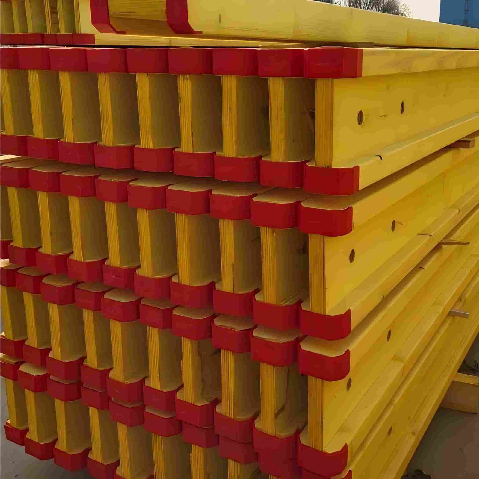 Timber I-joist beams used for construction formwork, flooring systems, and structural support applications